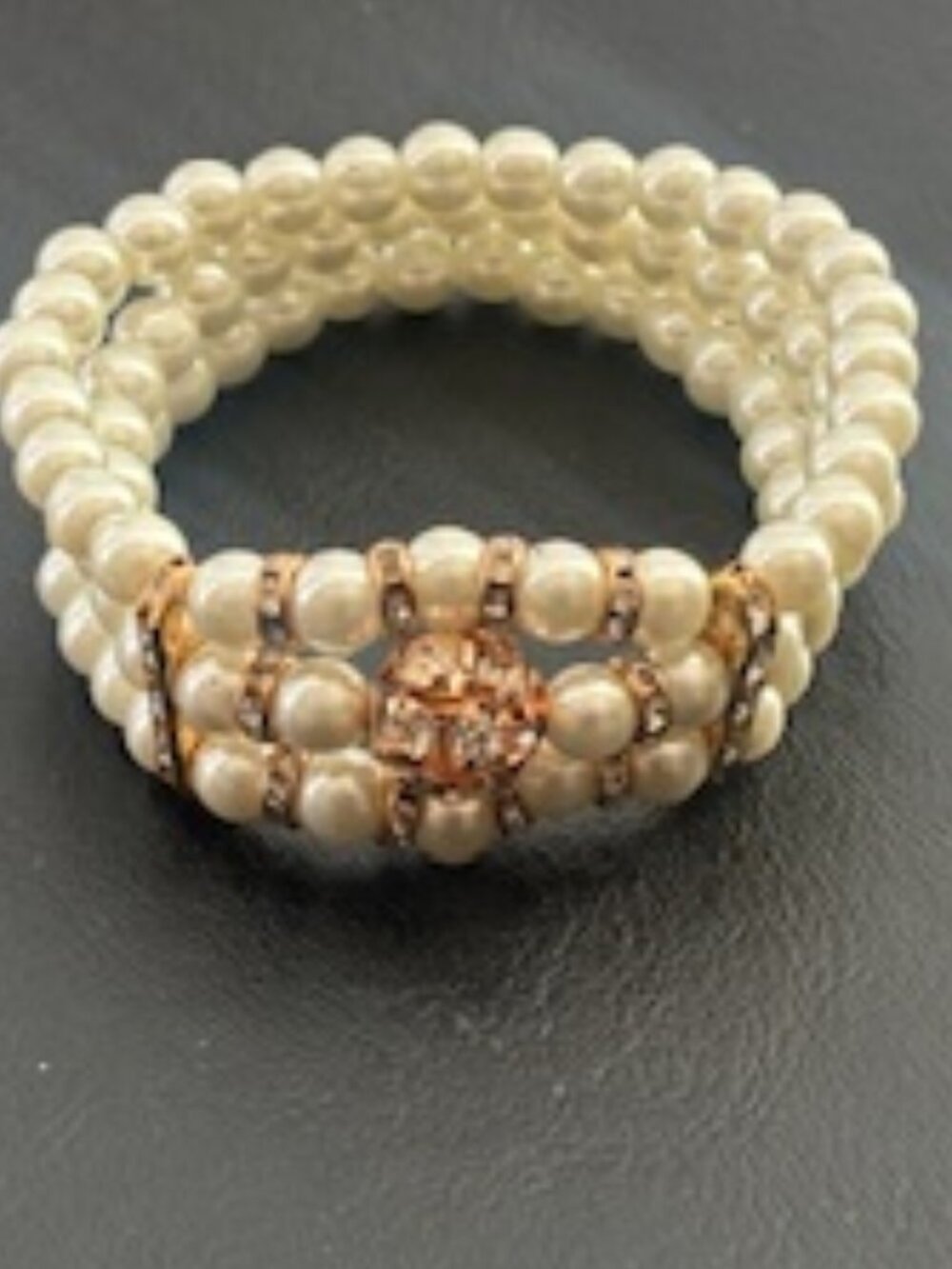Elastic three strand faux pearl bracelet-Crystal encrusted center